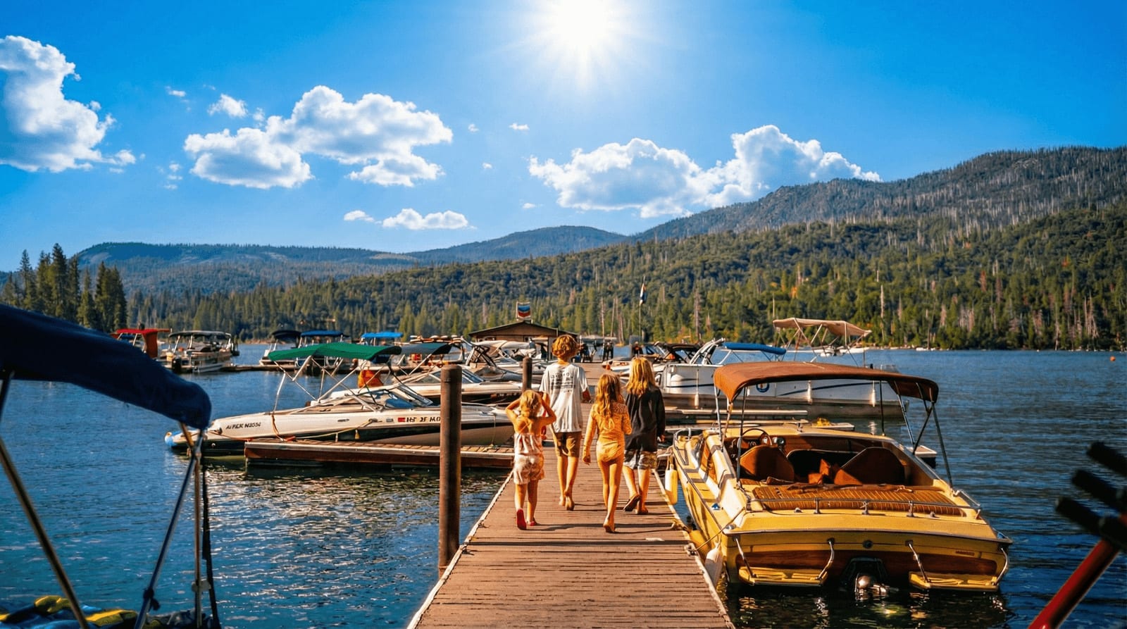Bass Lake docks with calm water surrounded by pine forests