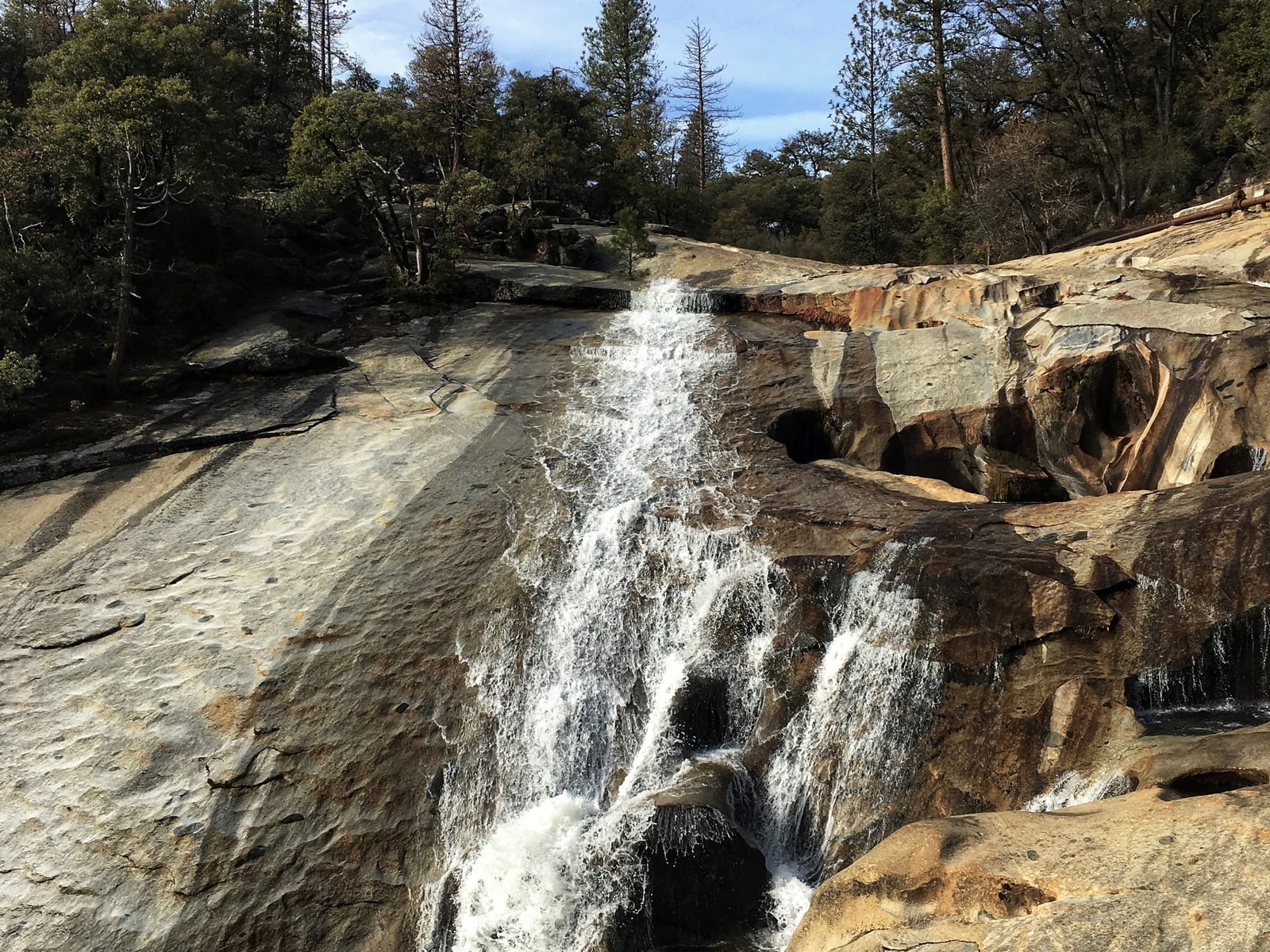 Angel Falls cascading over granite on Willow Creek, the hidden swimming cove a mile above Bass Lake